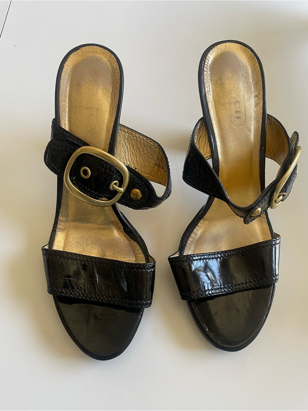 Coach Black Patent Slide Mules with Gold Buckle Accent